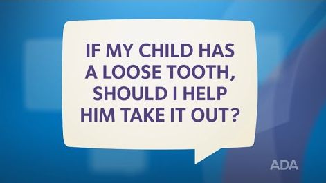 a conversation bubble with If my child has a loose tooth, should I help him take it out?